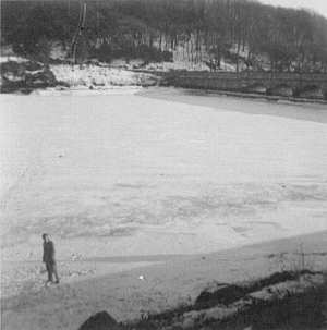 Brian Bishop walking on the iced over Burrator Reservoir in 1963