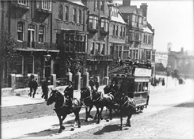 Trace horses help to haul a Plymouth Corporation tram up Tavistock Road near Sherwell Chapel.